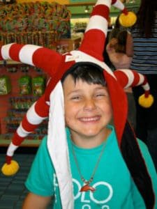 Boy smiling because parents enjoys parenting